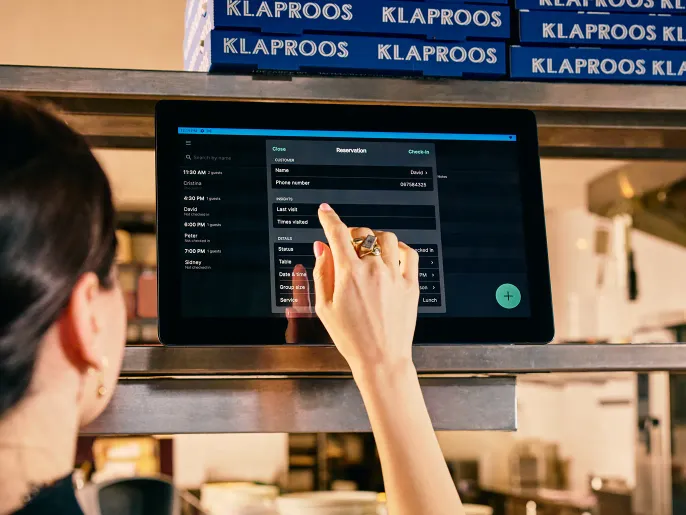 Tablet running Tebi on counter while somebody is using it.