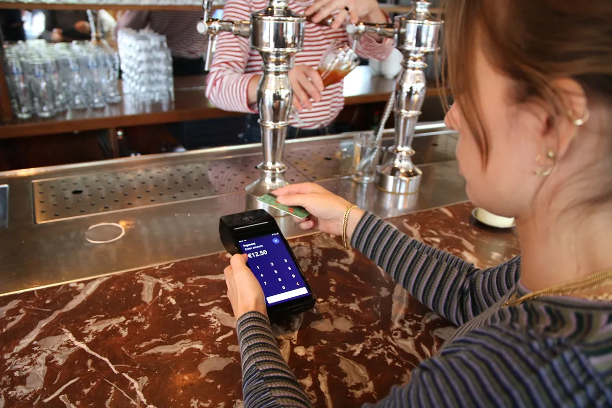 Somebody is paying by card on terminal